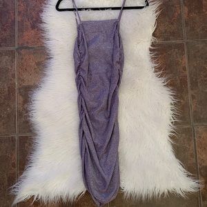 Super cute purple sparky dress.